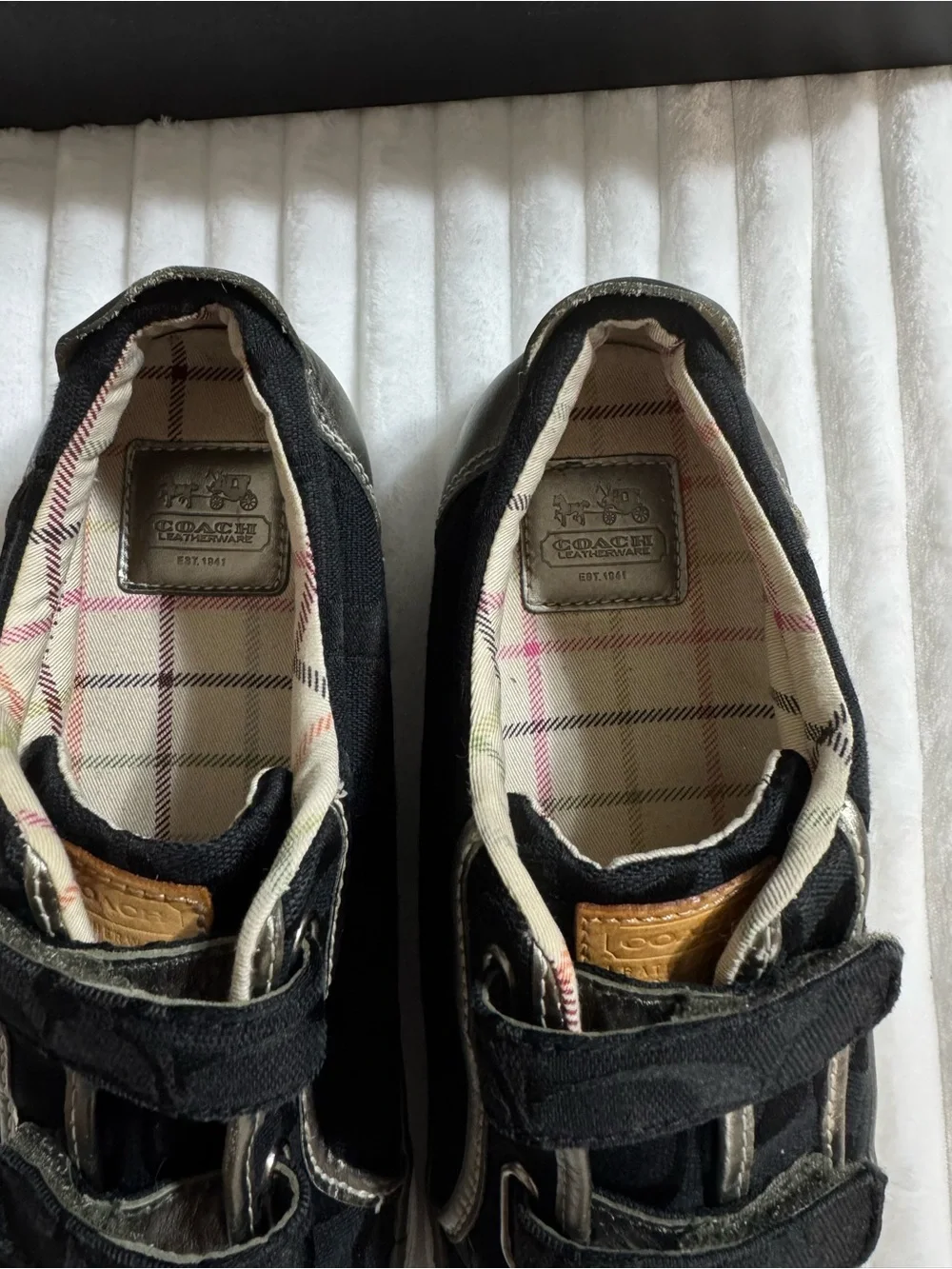 Coach Britt Black and Gold Logo Sneakers
